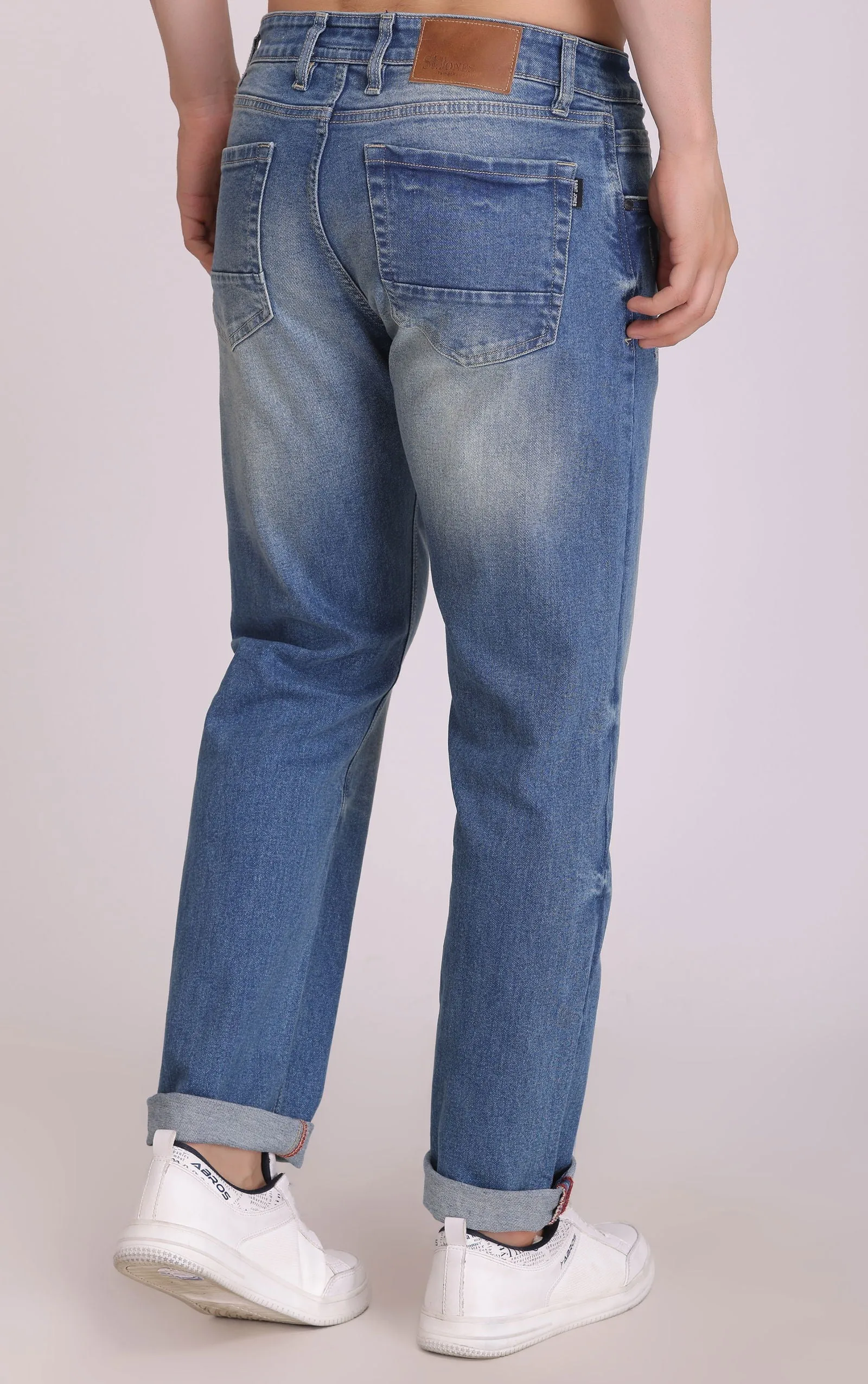 BLUE MID RISE RIPPED SLIM FIT JEANS